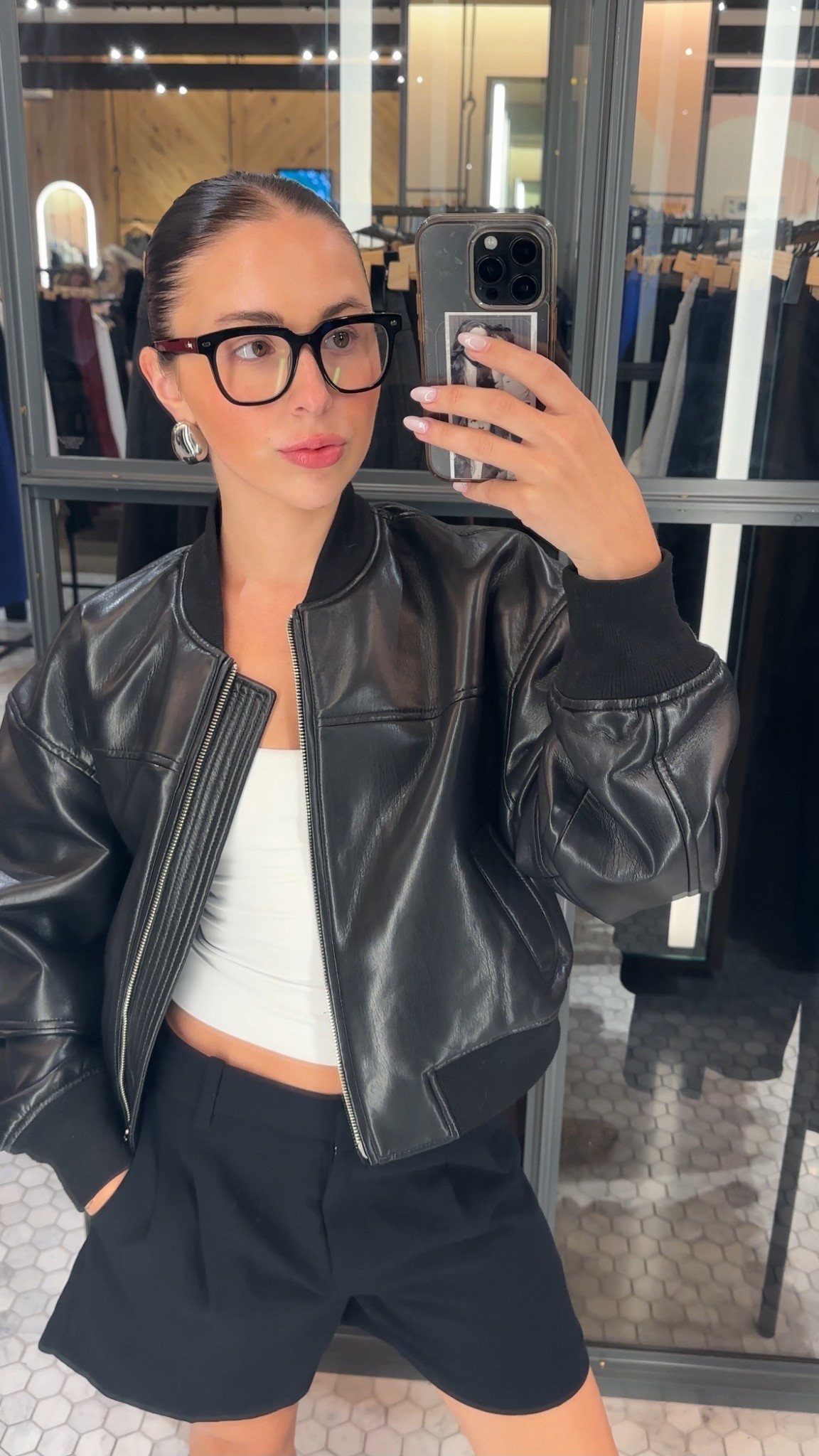 the slick back bun makes the outfit💋