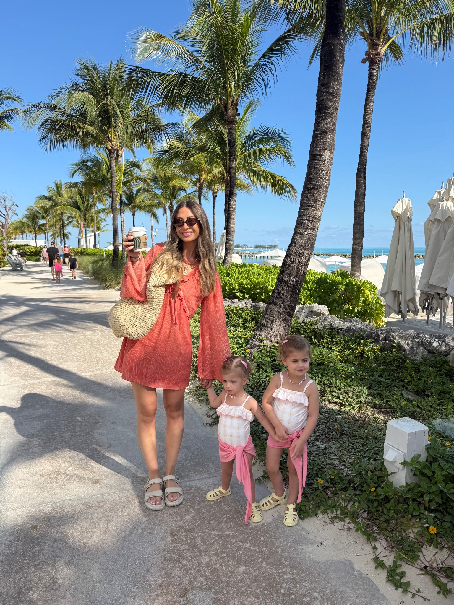 Beach day 2!! 🍊🧡  renting this cute dress & the girls swimsuits / sarongs are weekend swim! Linking their shoes & accessories (necklace is the shortest length available through Etsy for those asking!) 💖 

#LTKKids #LTKTravel #LTKSwim