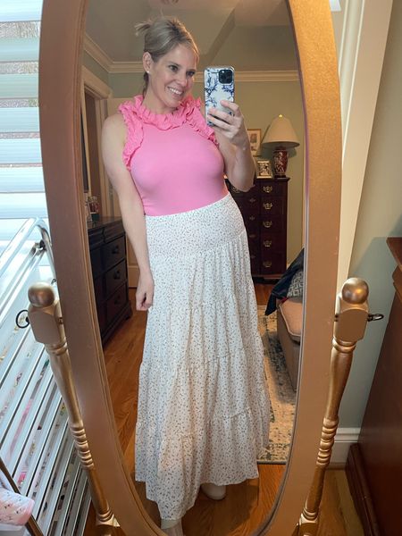 Pink ruffle bodysuit, floral maxi skirt 

#LTKfindsunder100 #LTKover40 #LTKfindsunder50