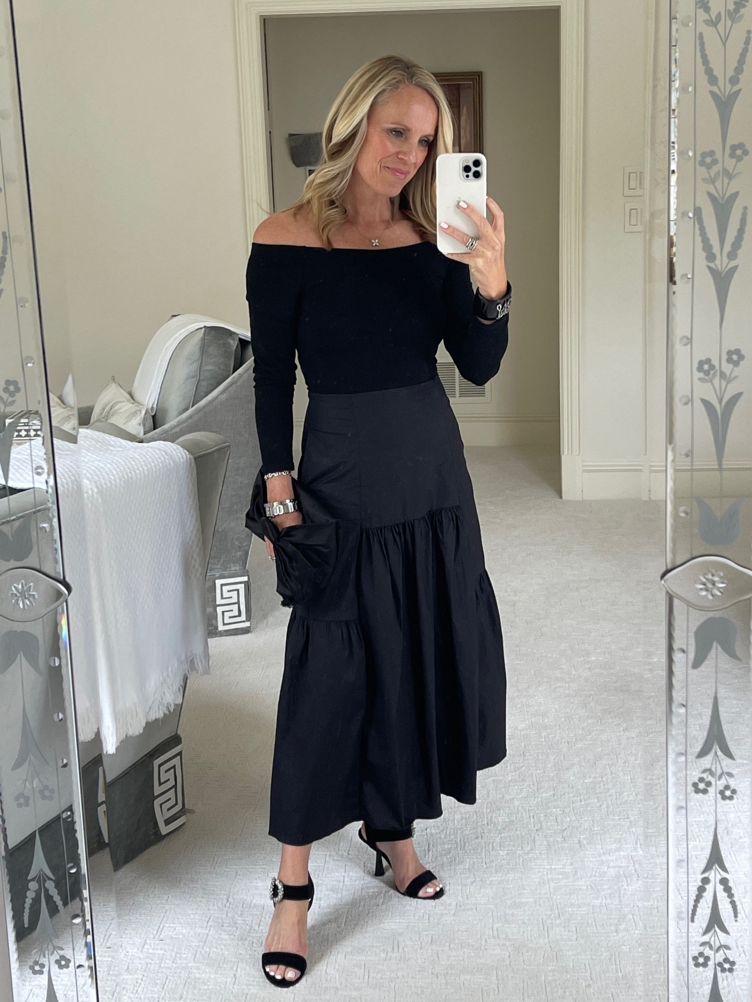 Classic black midi dress for holiday parties on sale! Great black clutch and Jimmy Choo heels 

#LTKCyberweek #LTKHoliday #LTKsalealert