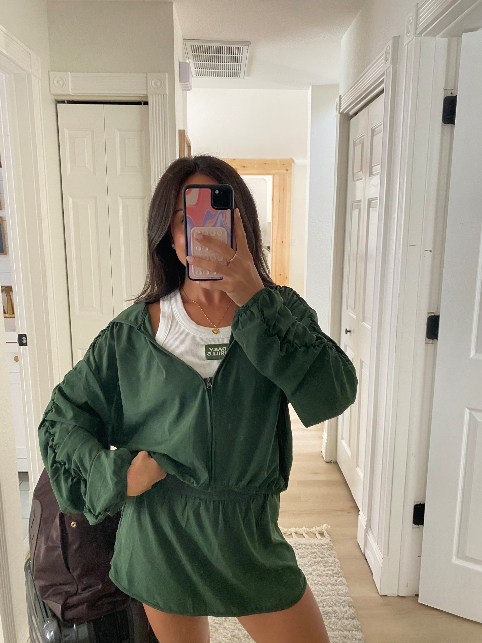 Airport travel outfit in Ptula athletic skirt and track jacket! Daily drills tank underneath! Size small in both 

#LTKActive #LTKFindsUnder100 #LTKStyleTip