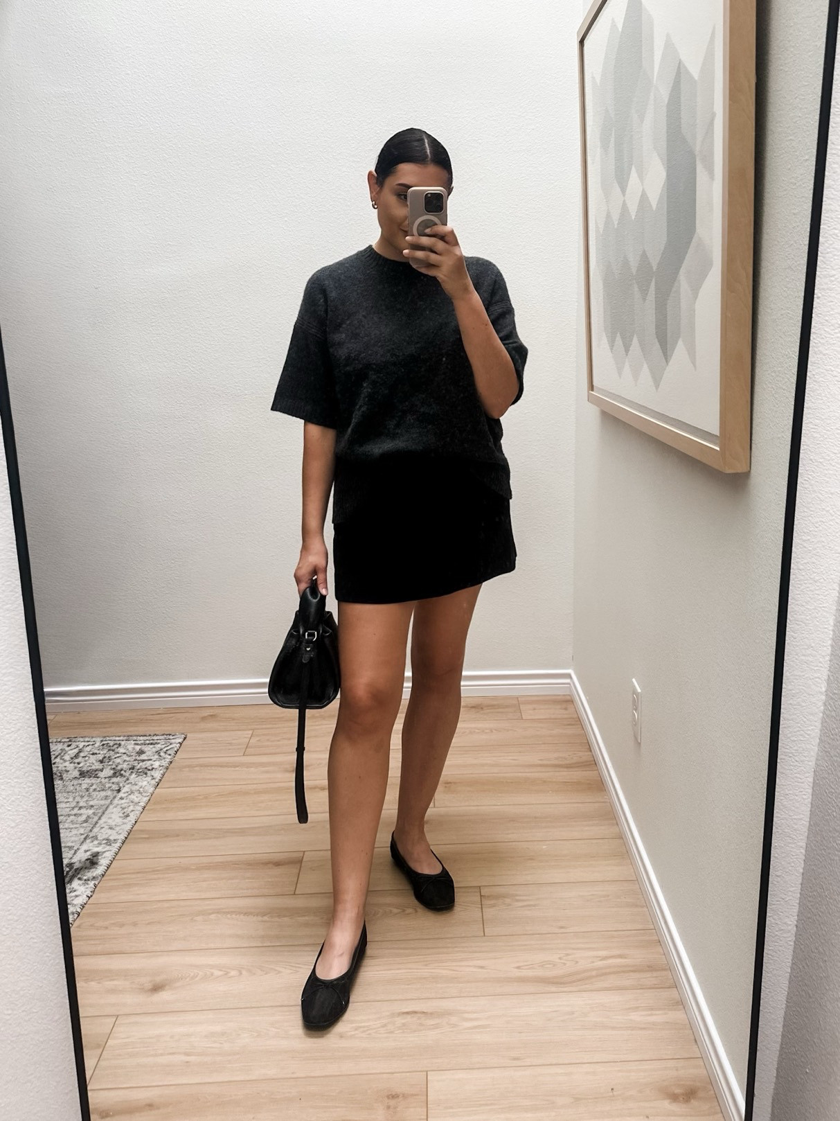 I'm in the medium of the sweater tee. It runs generously! I'm in the large of the skort. Runs slightly small / short.  

 