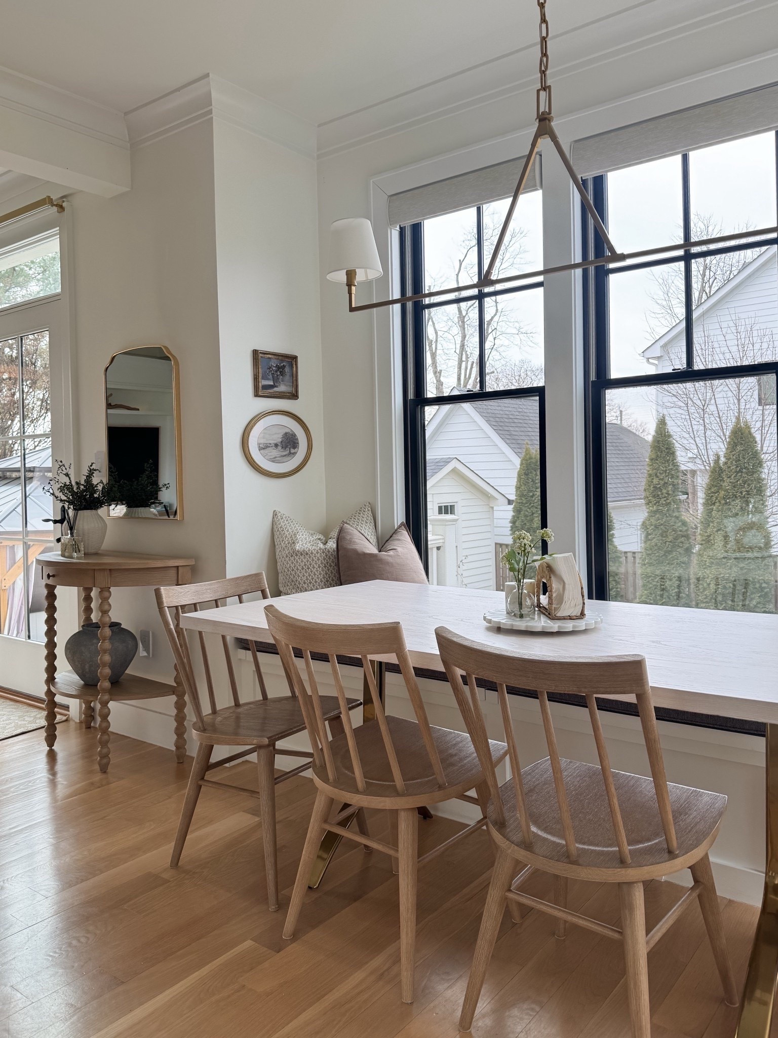 Our breakfast nook is one of the most lived-in spots in the house — and these pieces make it feel both special and practical.
The brass linear pendant adds that warm, tailored finish, the carved demilune table brings in soft character, and the wood chairs are my favorite kind of functional… beautiful and easy to wipe down for real life with kids.
Everything linked here for a curated, timeless nook moment.


#LTKmomlife #LTKHome