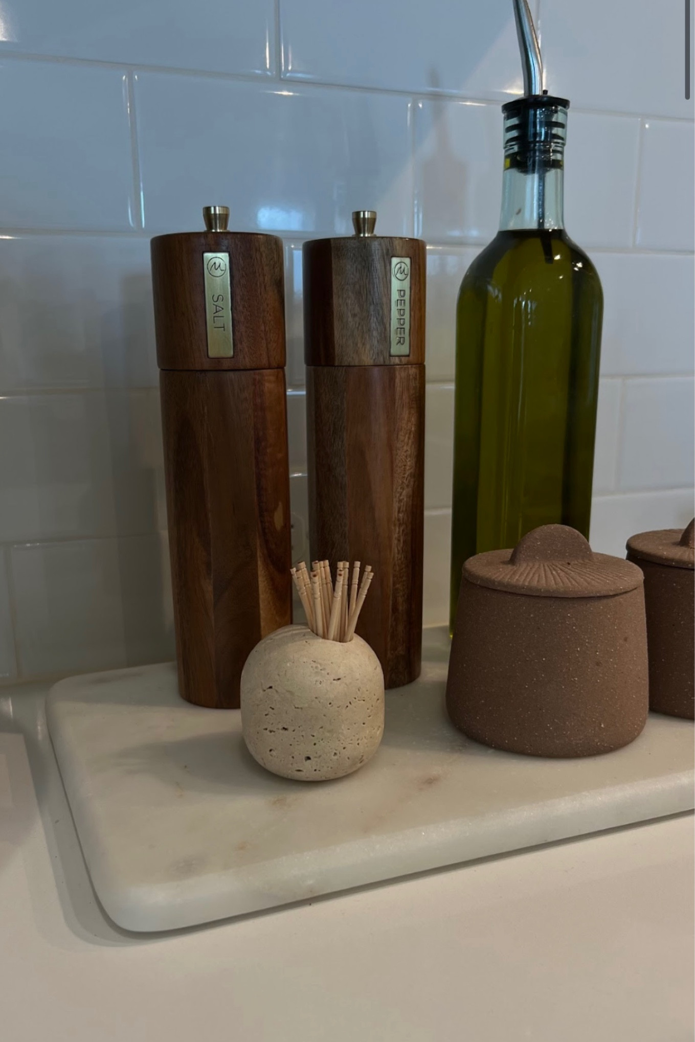 Neutral kitchen decor🤎


Coastal kitchen, house decor, home decorations, chic, toothpick holder, match holder, wooden salt and pepper shakers, white stone tray, marble tray, oil bottle dispenser, earth tones, summer

#LTKFindsUnder100 #LTKHome #LTKStyleTip
