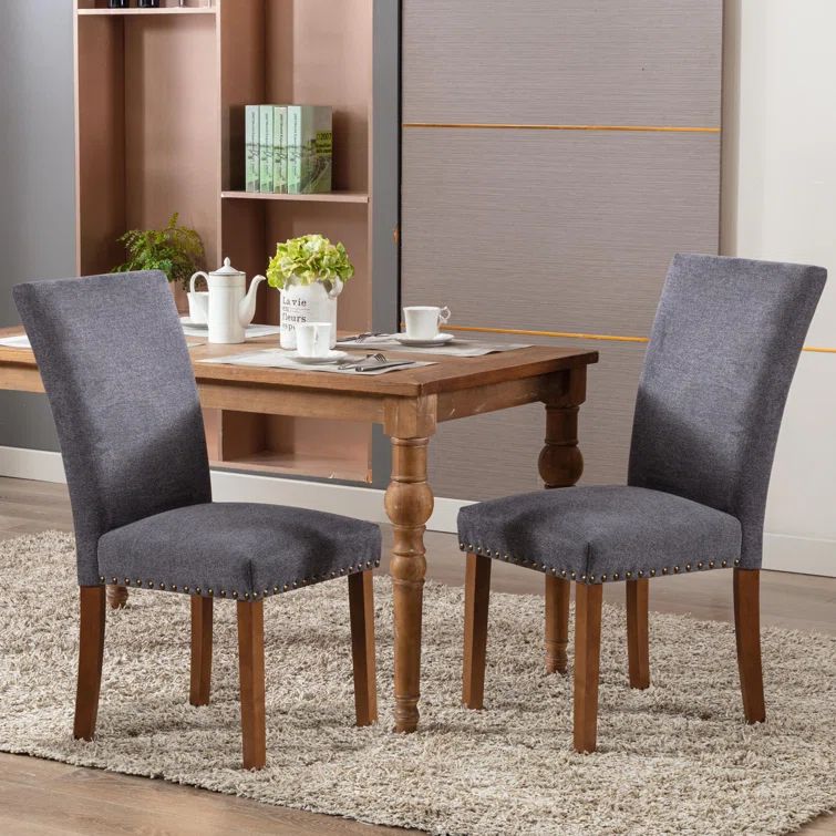 Upholstered Parsons Dining Chair with Nailhead Trim and Solid Wood Legs (Set of 2) | Wayfair North America