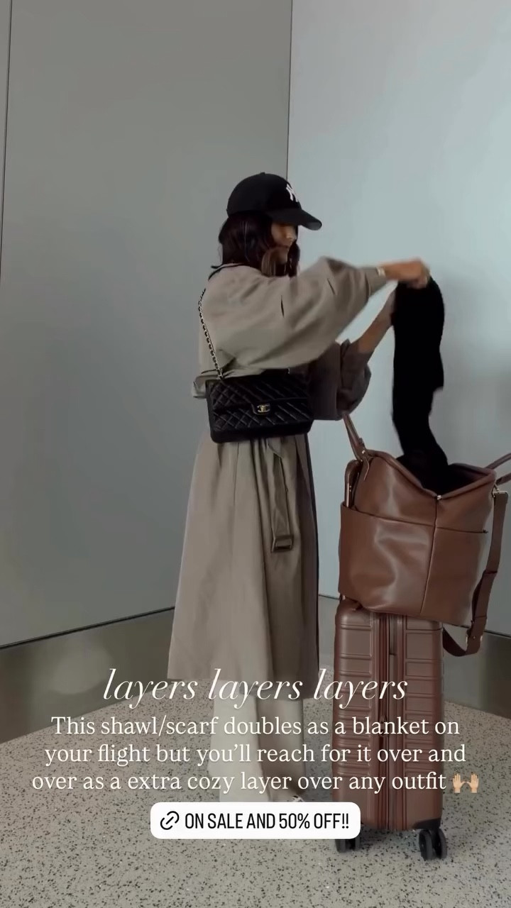 This shawl/scarf doubles as a blanket on your flight but you'll reach for it over and over as a extra cozy layer over any outfit

#LTKootd #LTKgrwm #LTKTravel