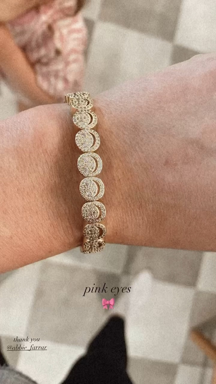 pink eyed smiley— cz stretchy and comfortable! this was a gift for going through breast cancer! Subtle and special 🎀💗