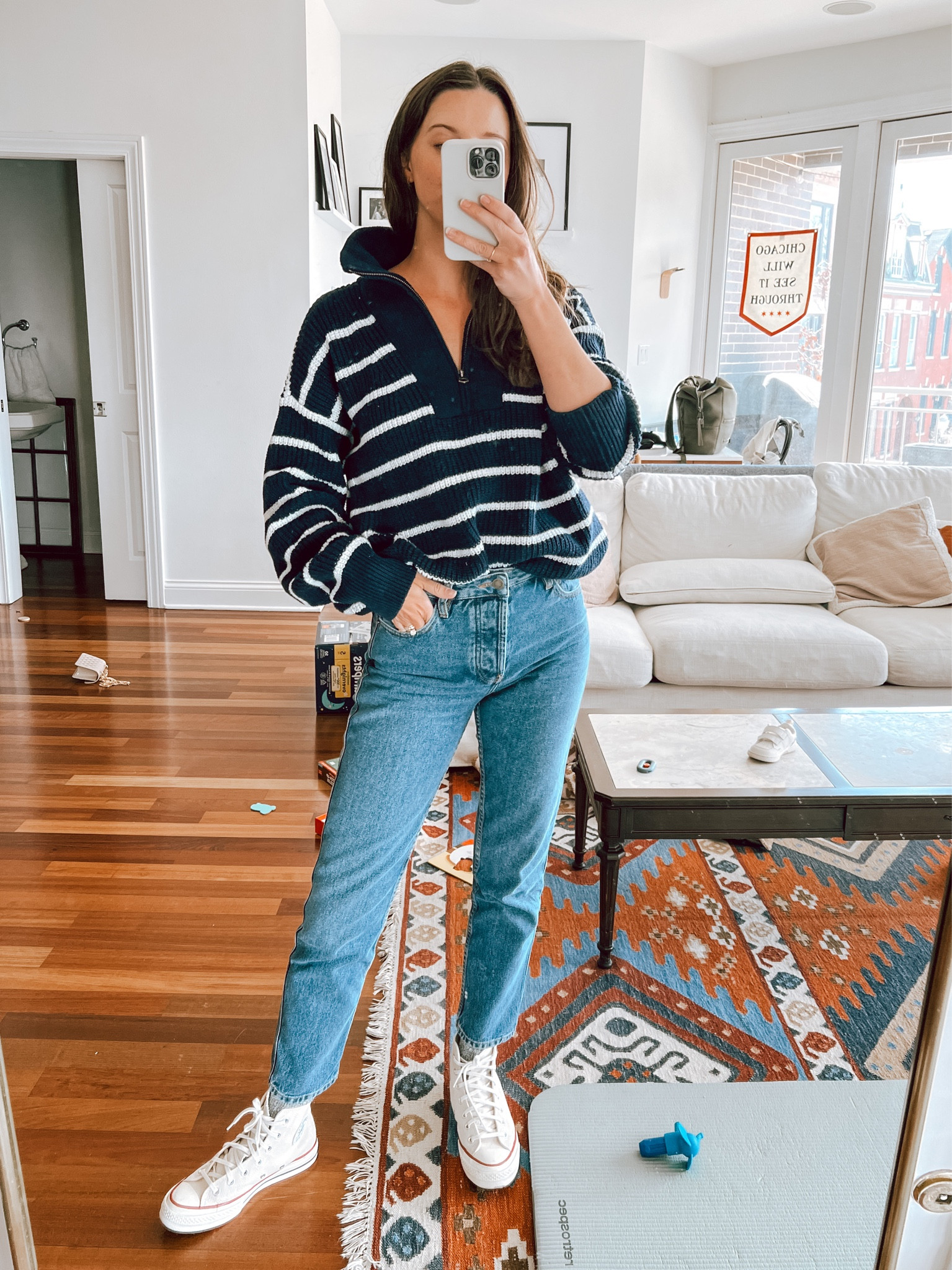 Wearing medium in sweater for oversized fit, jeans are Sezane (can’t link thru LTK anymore) and converse run 1/2 size big! 