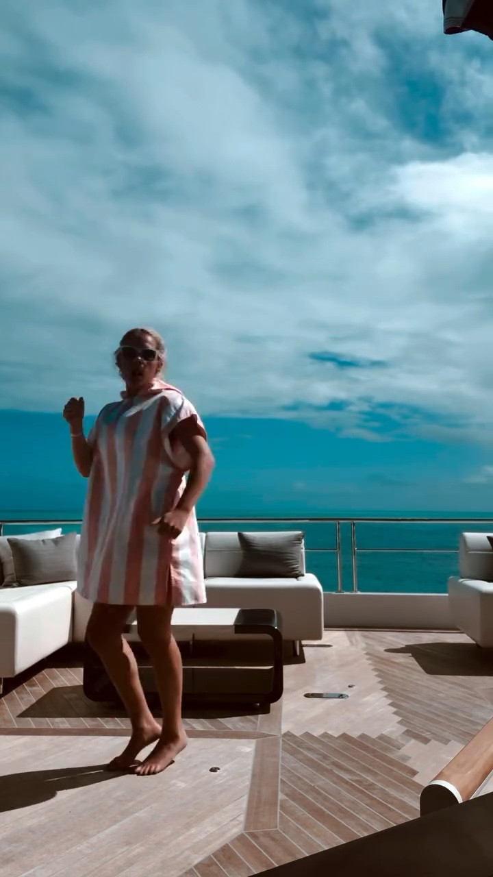 Megan Moroney's pink stripe Poncho - Hooded Towel with Deep Pockets, Changing Robe coverup

#LTKSwim #LTKTravel #LTKFindsUnder50