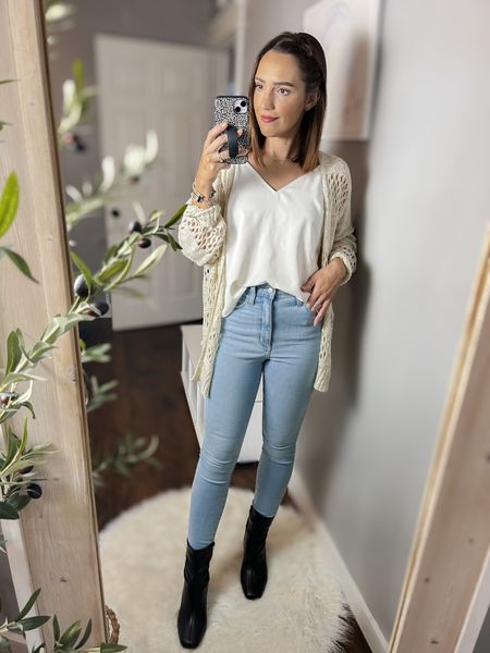 Target white cami tank top — TTS, S
Amazon crochet lightweight cardigan — TTS, M
Target high rise light wash skinny jeans — TTS, 6 
Target black ankle boots — TTS
Victoria Emerson bracelet 
Disc choker necklace Made by Mary
Home decor 

Denim, fall outfit, casual dressy, neutral outfit 

#LTKstyletip #LTKfindsunder50 #LTKSeasonal
