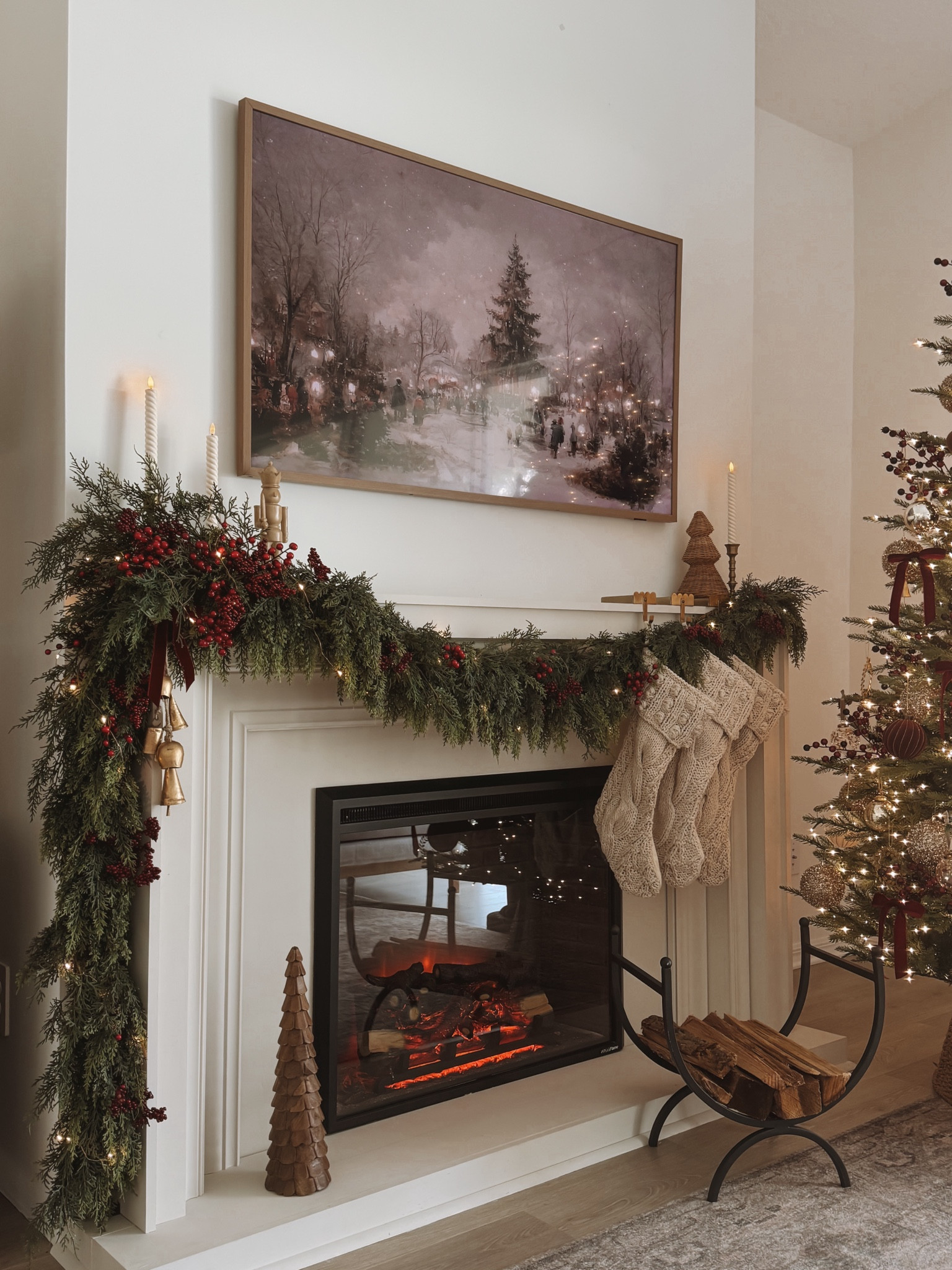 Christmas 2024 fireplace mantel reveal! 🎅🏼🌲🕯️

Having a fireplace to decorate for Christmas still feels like such a dream come true. 🥹 I added the same berry picks from my tree and also some cedar stems throughout the entire garland. Finished it off with some twinkle lights ✨ and kept the top of the mantel simple with stocking holders and other decor items. Comment “fireplace” to get the links to shop! 

#LTKSeasonal #LTKHome #LTKHoliday