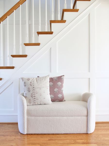 A current view below the staircase. A rounded Sherpa bench, floral block print square throw pillow and patchwork square throw pillow from Target Studio McGee 

#LTKhome #LTKFind #LTKstyletip