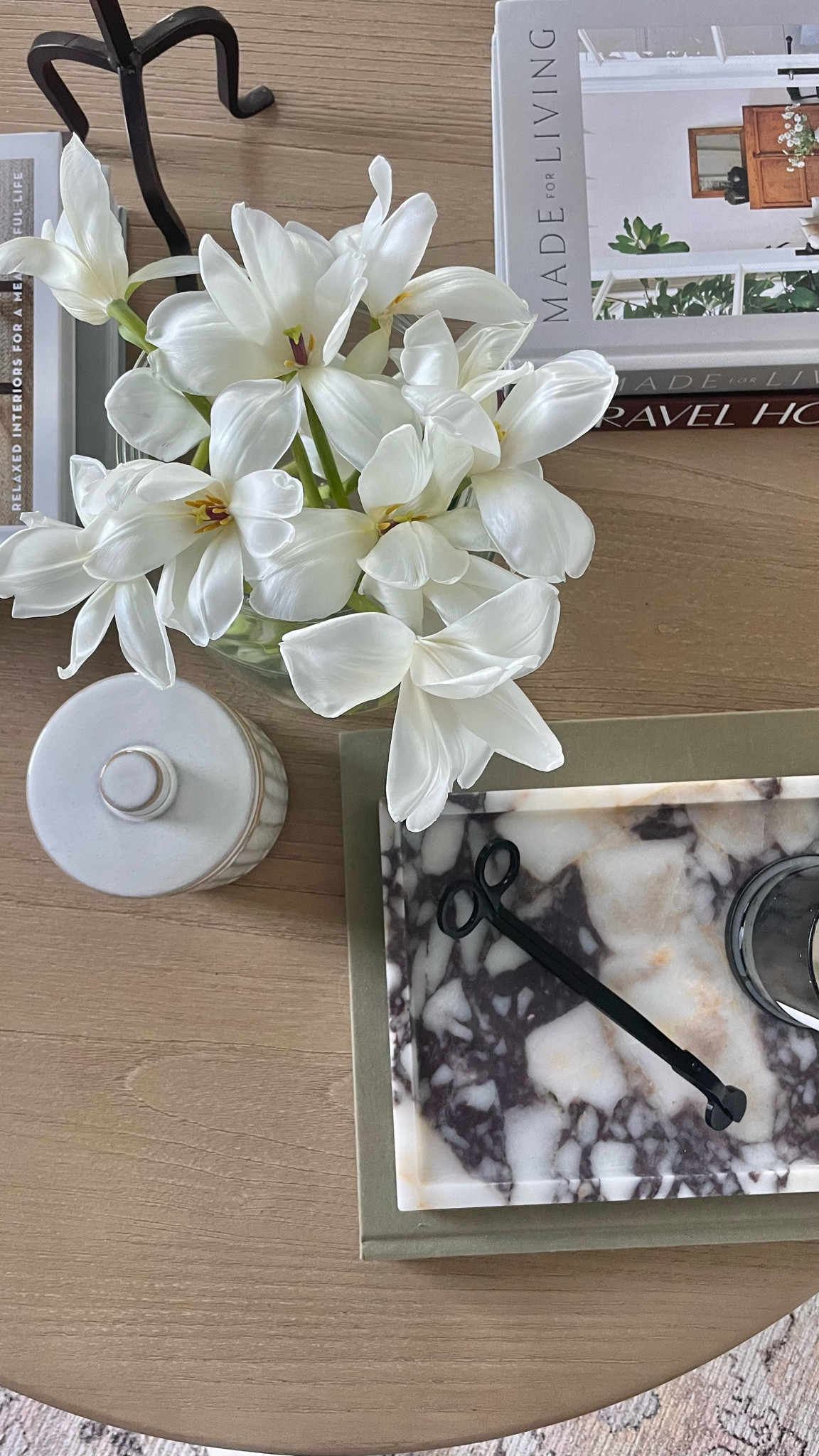 Coffee table decor, coffee table books, marble tray, canister, round oak coffee table 

#LTKunder50 #LTKhome