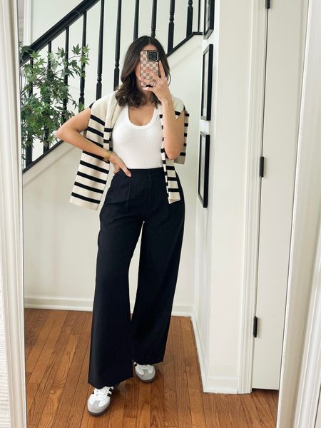 Elevated casual outfit 
White tank top, black trousers and sneakers 


#LTKfindsunder50 #LTKfindsunder100 #LTKstyletip