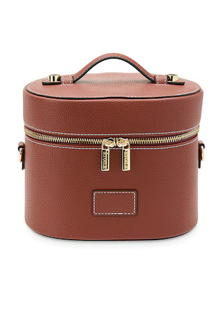 ETOILE COLLECTIVE Oval Toiletry Case in Ginger Brown from Revolve.com | Revolve Clothing (Global)