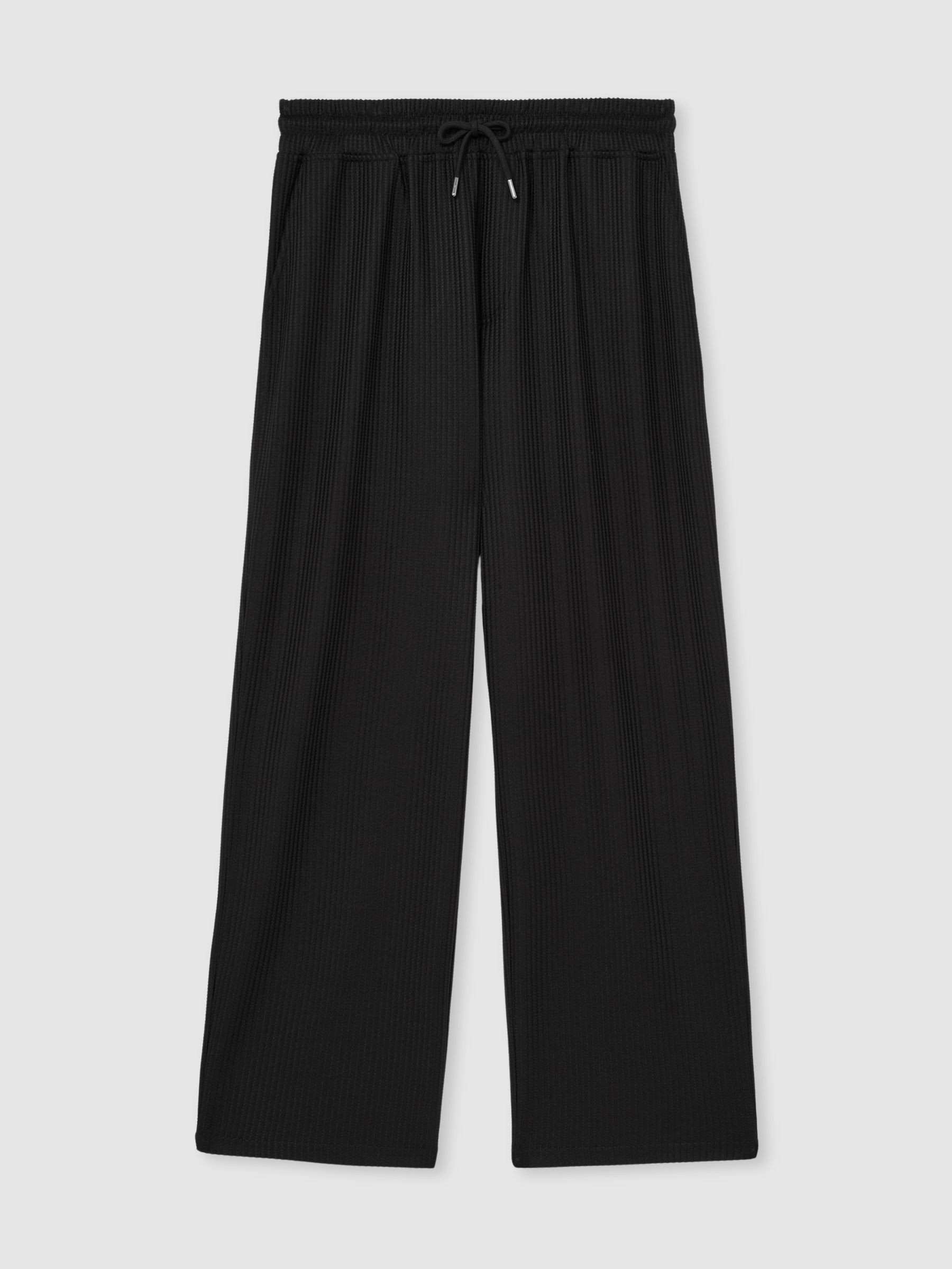 Reiss Textured-Knit Tapered Trousers in Black | REISS | Reiss US