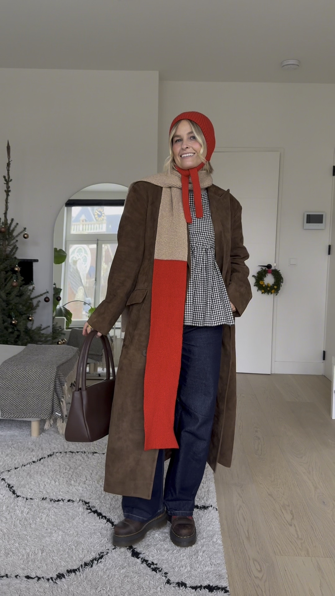 Cute winter layering outfit!

Red bonnet and scarf: CLÒIMH 
Gingham vest: Olive Clothing 
Suede coat: ducie (M)
Grey cashmere jumper: Uniqlo (L)
Jeans: urban outfitters (28W reg L)
Dr marten Bethan Mary Jane’s
Brown bag: status anxiety 

#LTKwinter #LTKuk #LTKeurope