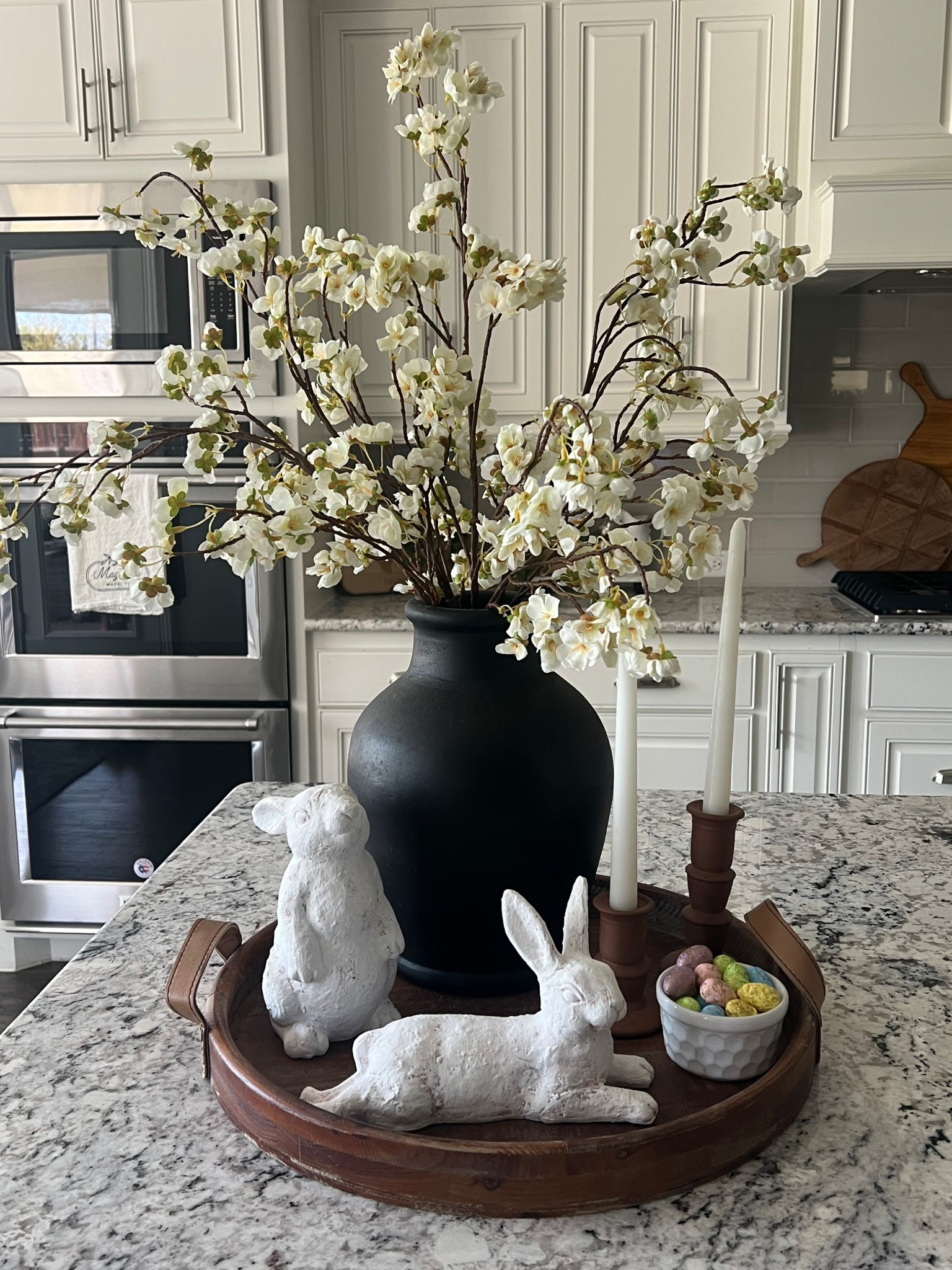 Copy my easy Easter tray! I have mine on my island but it’s also perfect for a console, dining or  a coffee table. You may already have some of this stuff sitting around, it’s so easy to throw together to make a cute little vignette.

#chiconashoestringdecorating #Easterdecor 

#LTKHome #LTKSeasonal