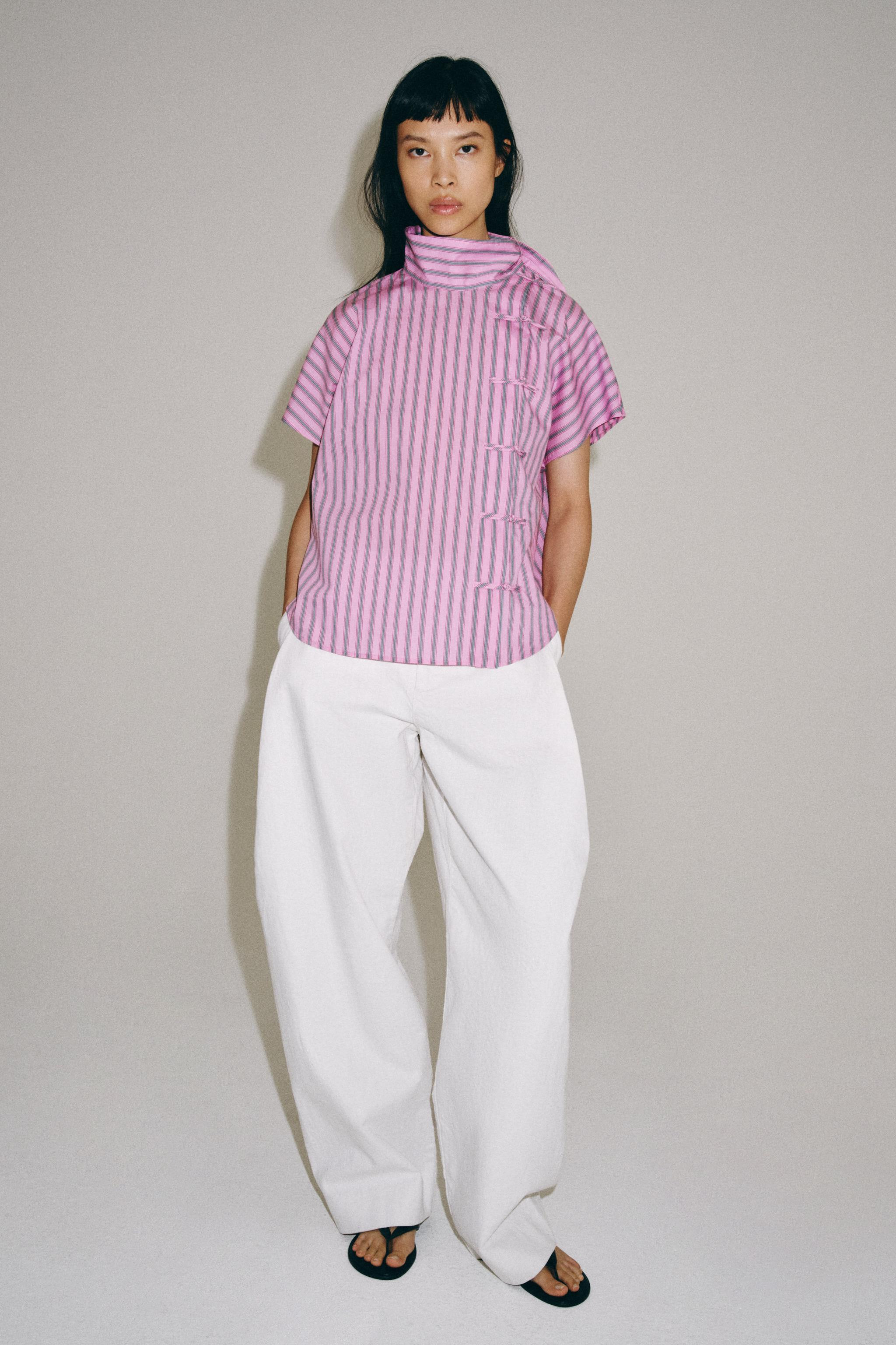 ZARA WOMAN COLLECTIONShirt made from a cotton blend yarn. Stand-up collar and short sleeves. Stra... | Zara US