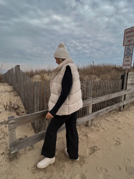 Abercrombie black long sleeve basic tees and lululemon elastic waist cargo pants with Chelsea boots and amazon puffer vest and designer inspired beanie for a winter beach look, cold weather spring transitional look, 

#LTKstyletip #LTKSeasonal #LTKcurves