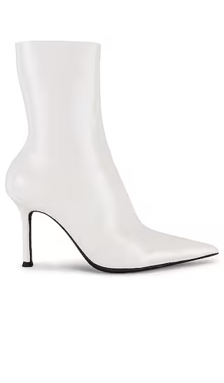 Daring Boots in Coffee | Revolve Clothing (Global)