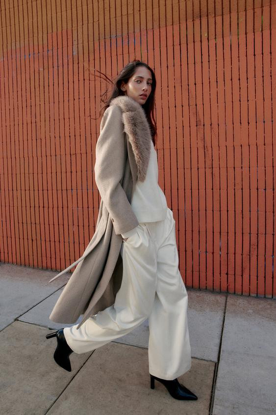 Wool coat. Removable faux fur lapel collar. Long sleeves and shoulder pads. Front welt pockets. B... | Zara US