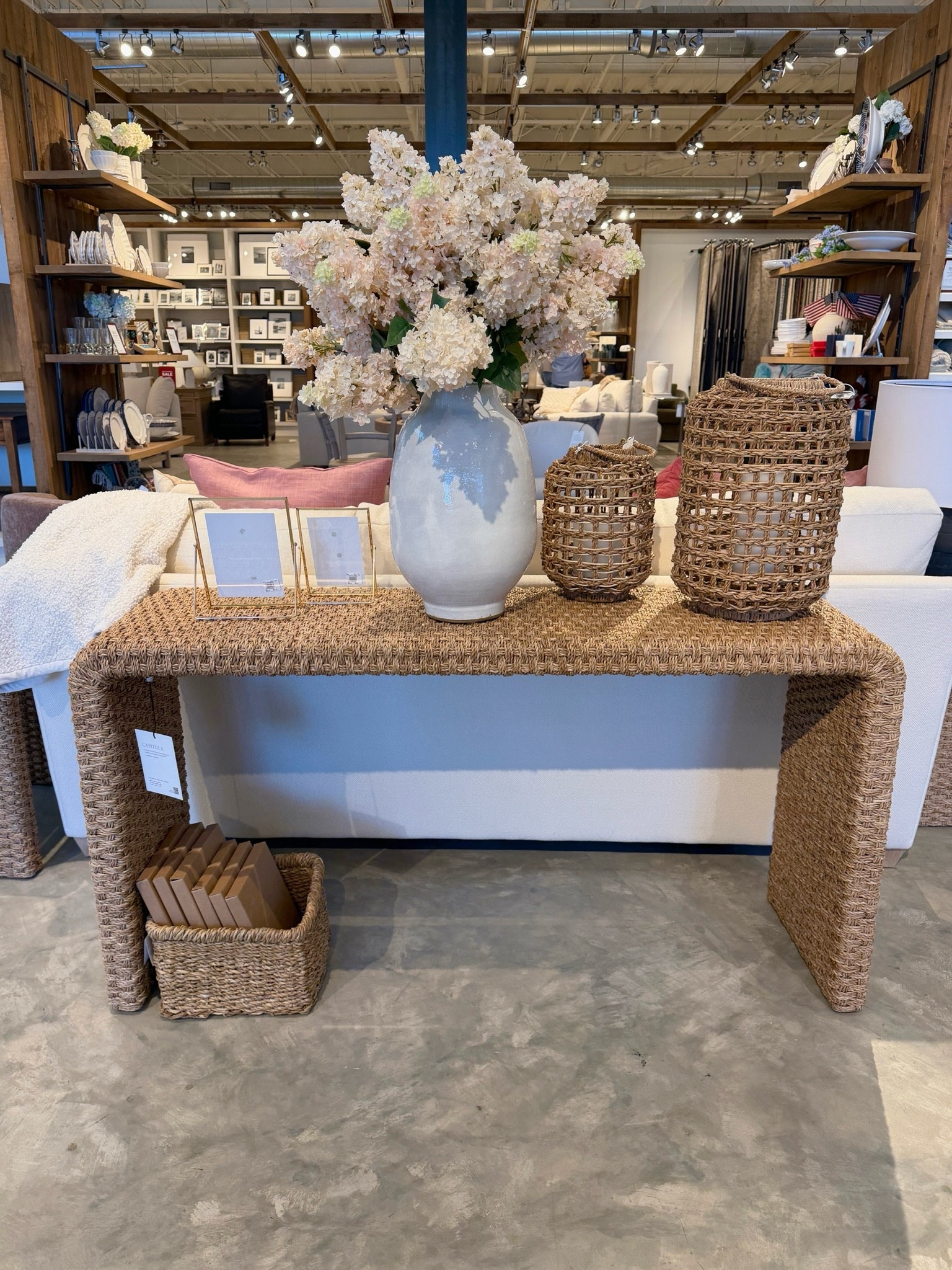 Coastal console table inspo! 🐚 The Capitola Woven Console Table from Pottery Barn adds such beautiful texture with its woven detailing and warm natural finish. 🤎 Perfect for an entryway, behind a sofa, or styled with artwork and lamps for that relaxed coastal look. 😍 Love how light and airy this piece feels while still making a statement. Linked it here!✨ @Pottery Barn #consoletable #furniturefind #potterybarn

#LTKHome #LTKSaleAlert