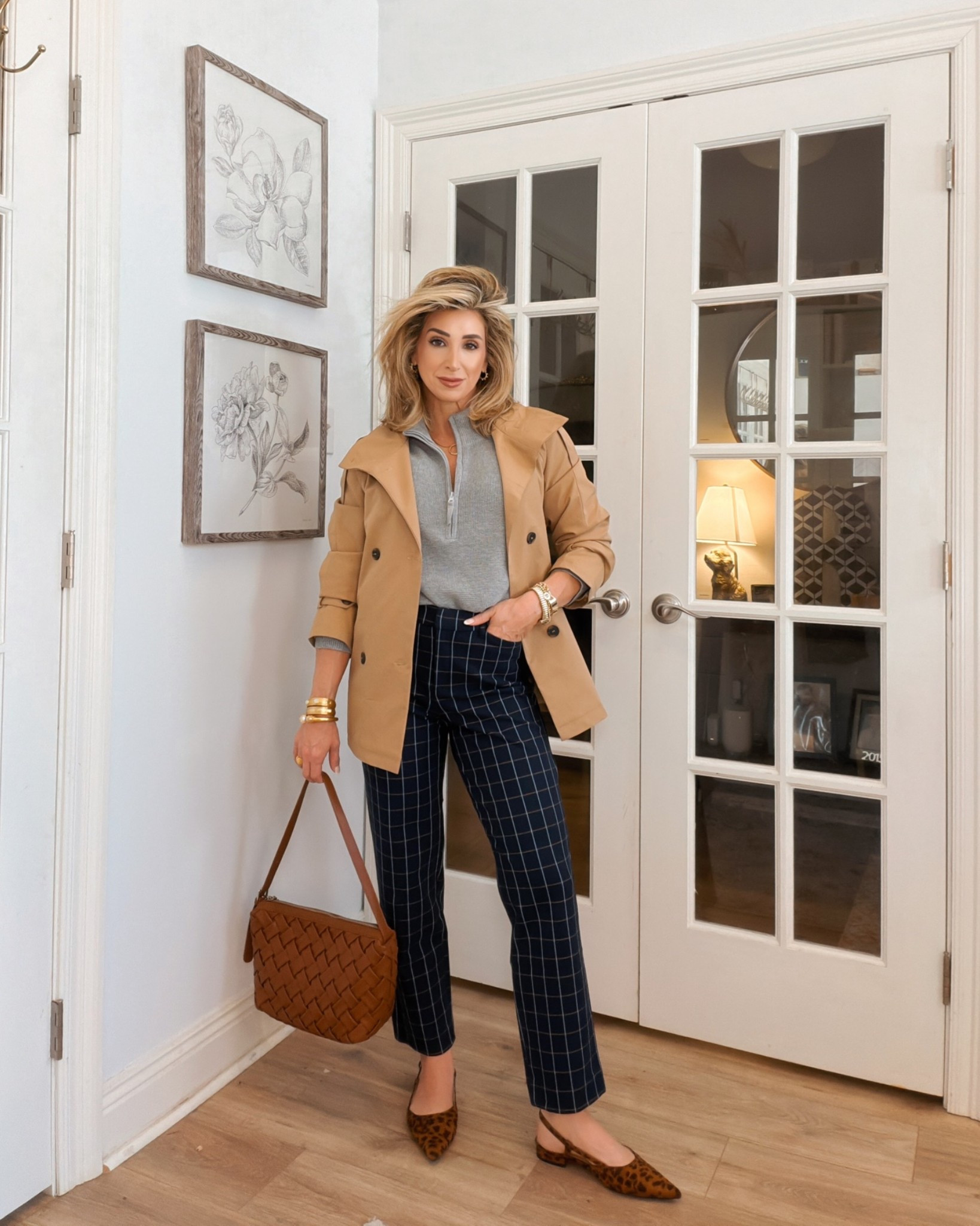 A casual outfit that switches out the denim for these elevated plaid pants. 

Trench coat, fall outfits women over 40, petite style, grey quarter zip sweater top, outerwear