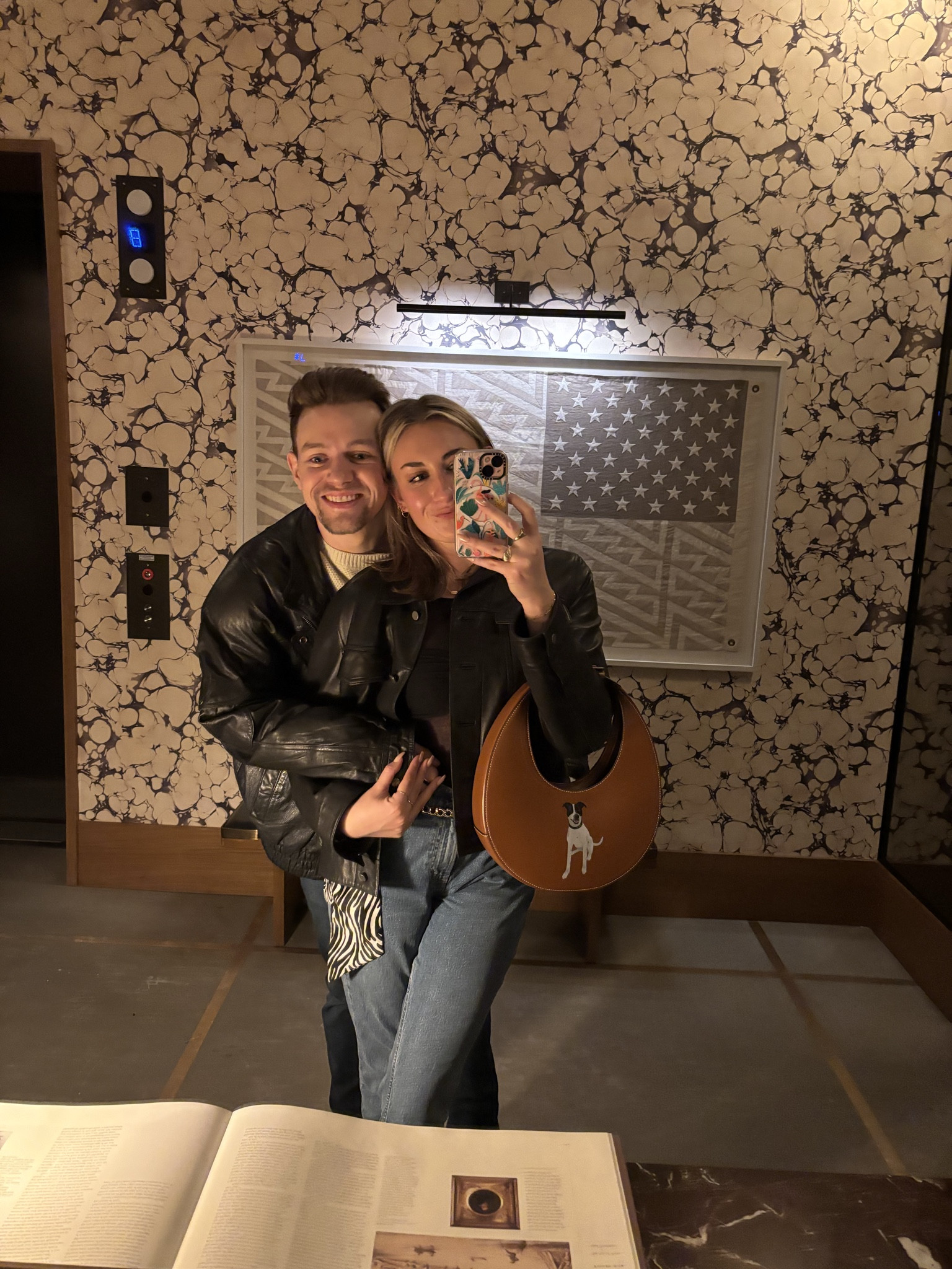 Fall Date Night calls for mixed leather and bell bottom jeans. 

I don’t know about you, but after Kendrick’s half time performance last year, I had to get a pair of flair jeans. 

I styled them with a long sleeve black top that is perfect for the bars, and my favorite thrifted leather jacket. 

Tyler went the same route, but instead of a little black top he opted for a tan sweater. 

We both went for boots this night. Tyler lives in his red wing boots, and I wore mine from Madewell. 

I topped the otherwise basic look off with my Staud Otis bag, and a fancy vintage belt from my mom’s collection! A belt and fun purse can truly change your whole look. 

#LTKSeasonal #LTKItBag #LTKStyleTip