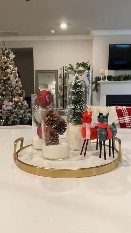 These are so simple and easy to make.  A classic and pretty Christmas table decoration idea. 🎄
.
Christmas centerpiece, Christmas table decor, Christmas decorations.
#christmashome #christmasdecor #christmastable #christmascountertop

#LTKSeasonal #LTKhome #LTKHoliday