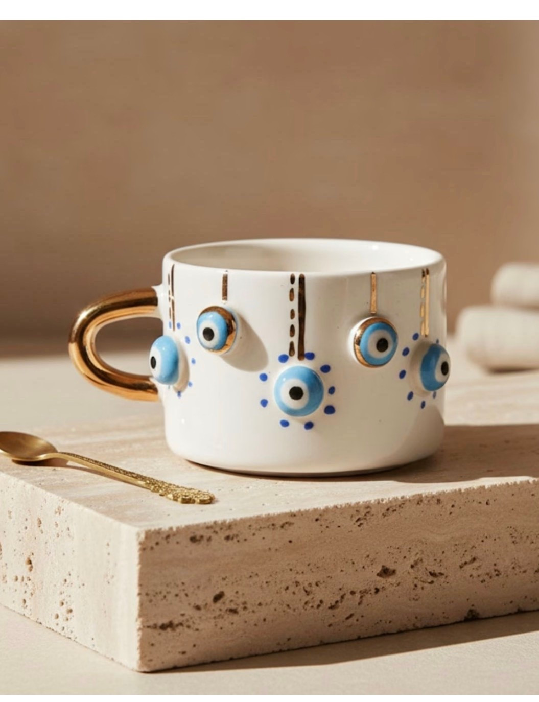 Handmade Evil Eye Ceramic Mug - Gold-Plated Handle

Embrace the mystique and protection of the ancient Nazar with this striking Handmade Ceramic Mug. Featuring the iconic Nazar eye symbol

#LTKSeasonal #LTKdayinmylife #LTKHome