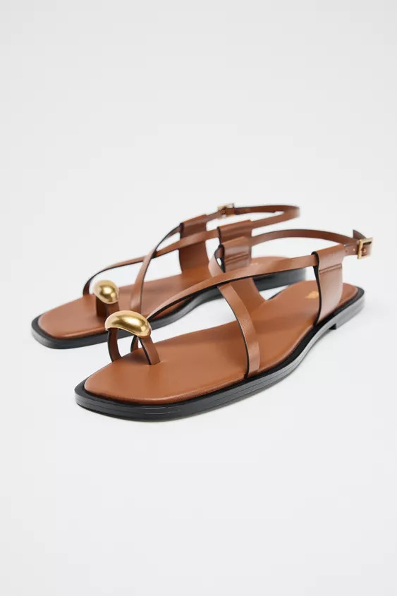 Flat sandals with thin straps and metal toe detail. Buckle closure.Sole height: 0.6 inches (1.5 c... | Zara US
