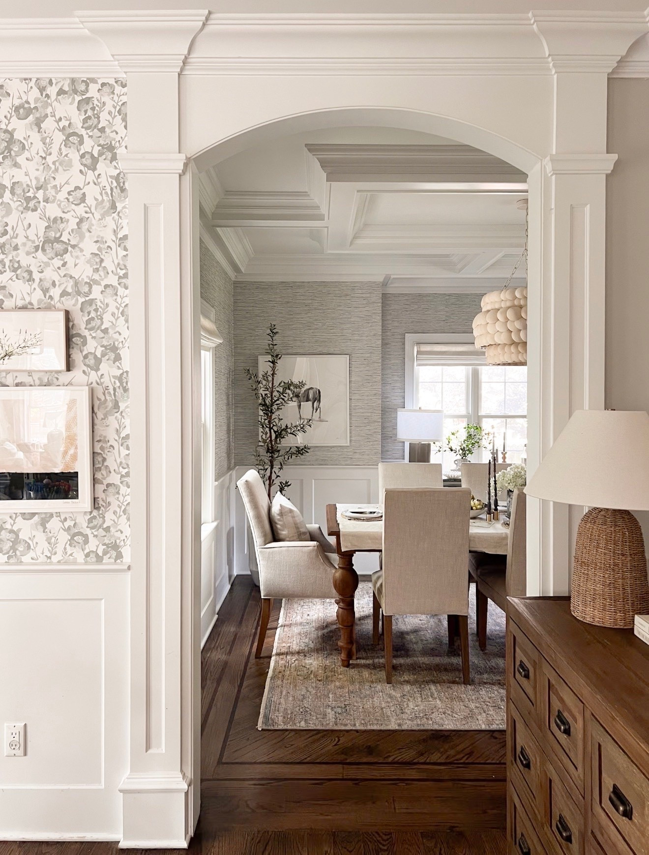 One of my favorite things about decorating a home is creating spaces that feel connected from room to room. I love how the soft wallpaper, warm wood tones, layered textures, and neutral palette all flow together here while still allowing each space to feel special on its own. This little view into the dining room feels so calm, cozy, and timeless, especially with the natural light pouring in during the afternoons.

neutral home decor, timeless interiors, traditional home design, dining room inspiration, cozy neutral home, layered home decor, wallpaper inspiration, warm wood interiors, classic home styling, elevated everyday living, Girl on the Hudson

#LTKHome #LTKSeasonal