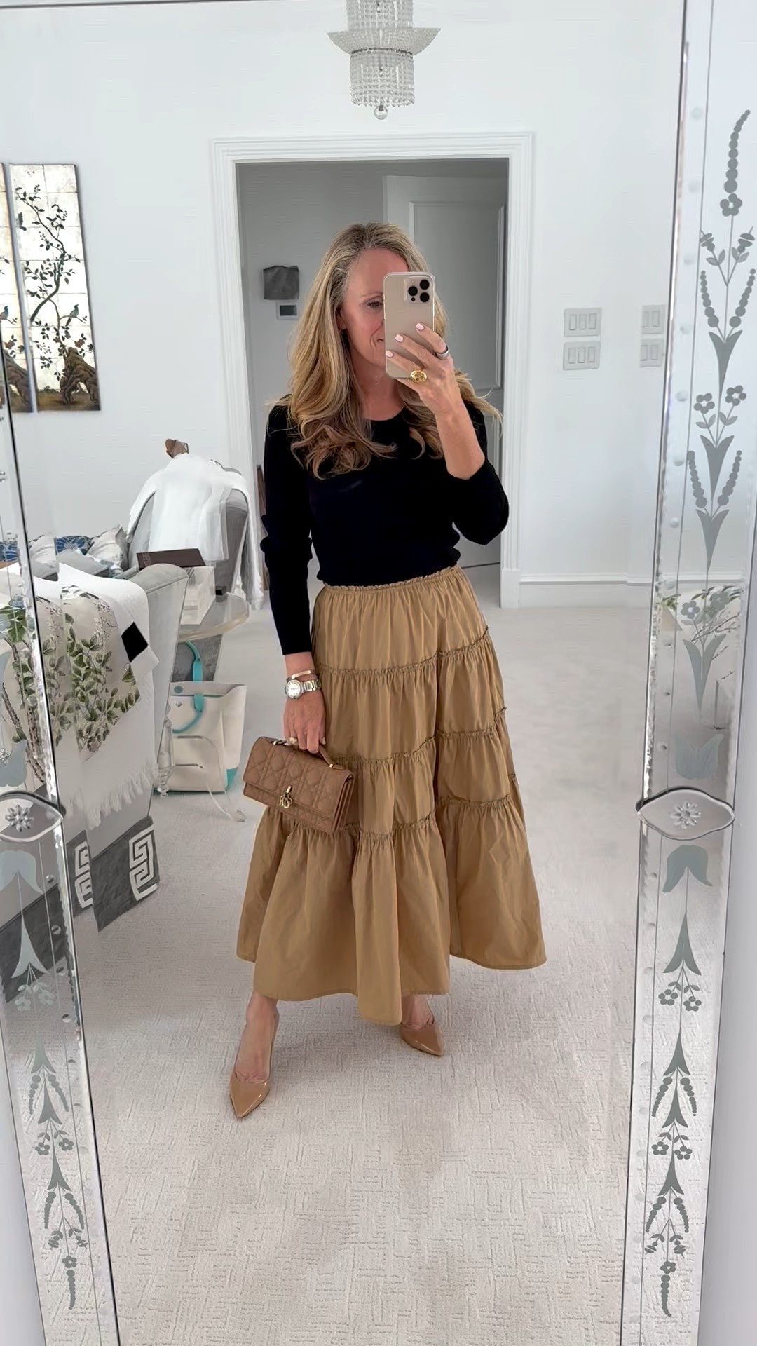 Holiday luncheon style
Mixed Media dress from Brochu  Walker 
Black fine ribbed sweater with taffeta like skirt 
Fits true to size
My Dior mini bag
Stewart Weitzman Power 100 heels in nude
