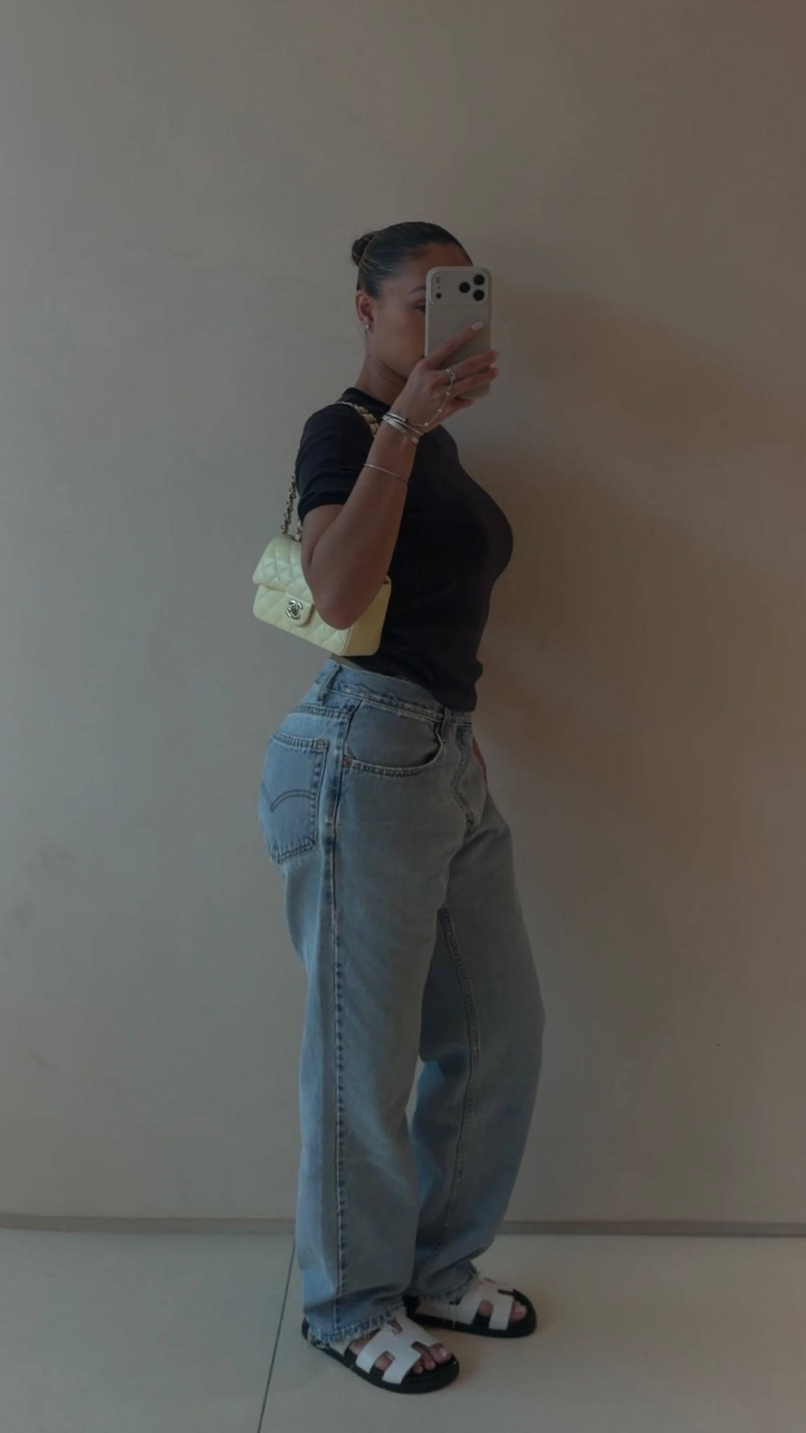 top: courreges (xs - i sized down) jeans: vintage levi’s 550 straight leg (from denim heaven - size 32 & altered waist) sandals: hermes (i got full size up) bag: chanel

#LTKU #LTKgrwm #LTKootd