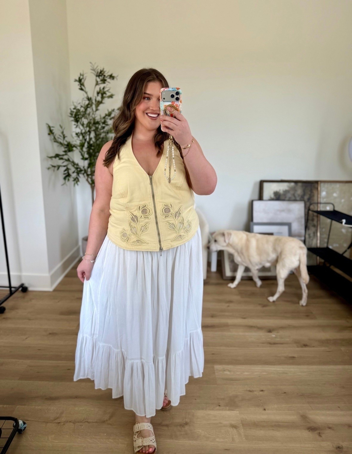 I’m fairly convinced this yellow 🧈💛 top from @Eloquii  is my best purchase of the summer. I am obsessed with the halter vibes and this color is absolutely gorgeous. I’m wearing a size 18 and feel so confident in this. The exact skirt I’m wearing is a couple years old, so I’m linking a few other options. 
Yellow and white summer outfit inspo ￼