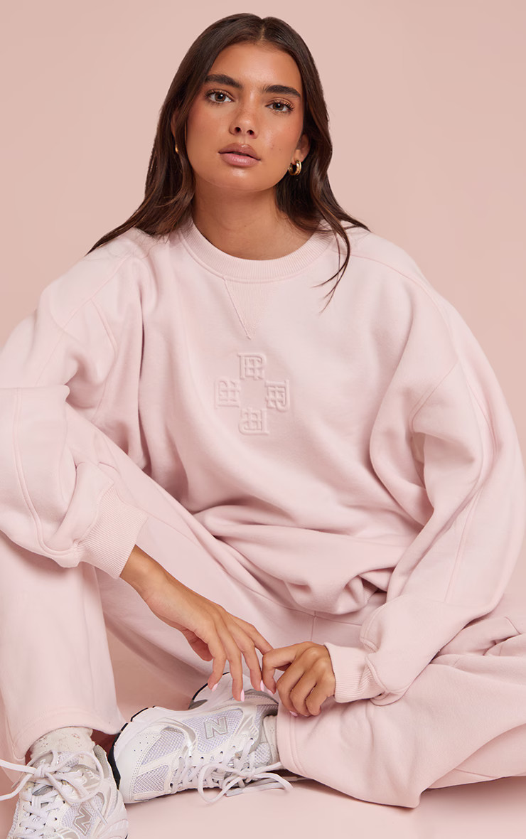 Baby Pink PLT Embossed Crew Neck Sweatshirt | PrettyLittleThing UK