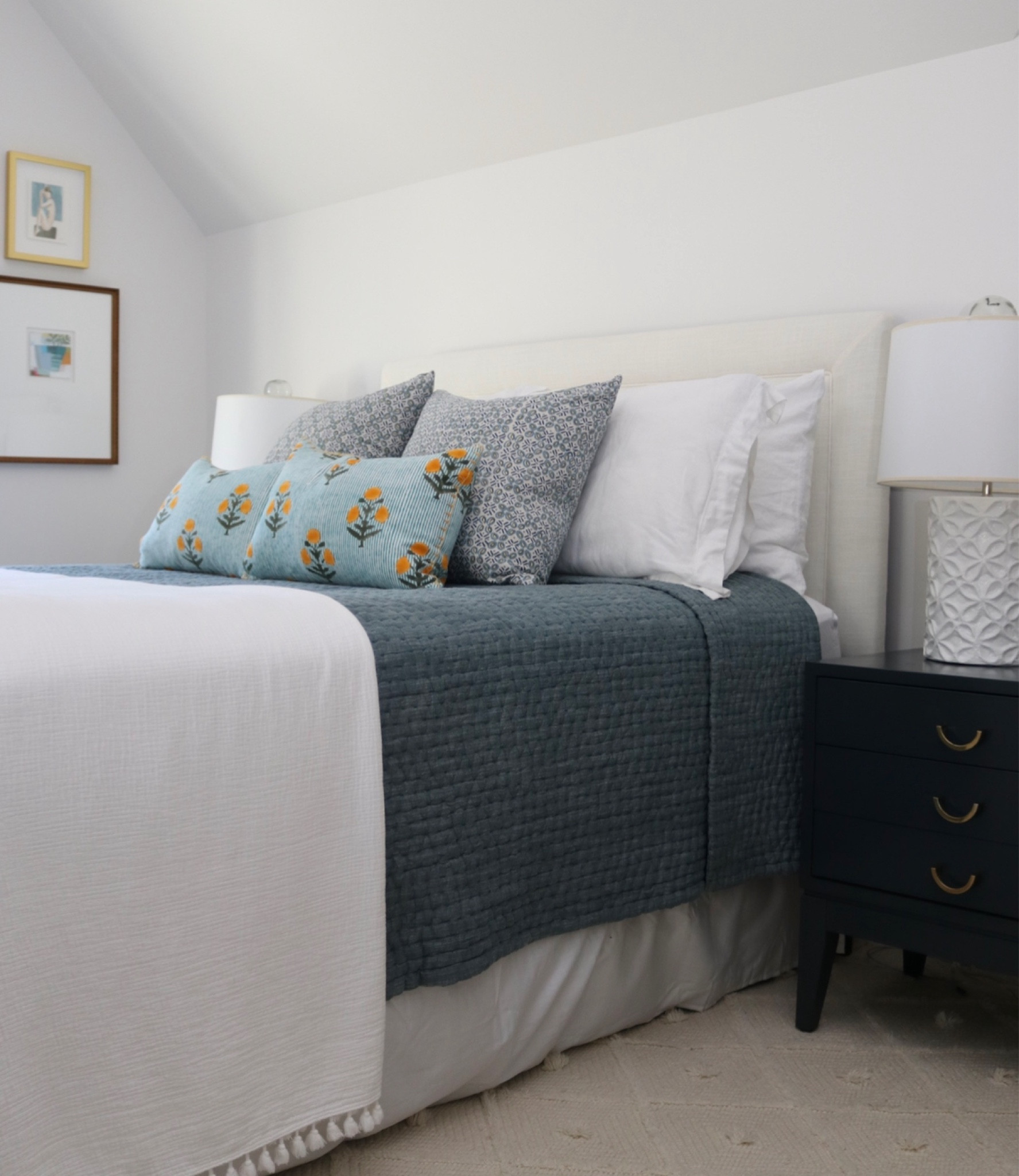 I found these nightstands for a STEAL! They completely updated the look of the guest bedroom. Paired with my favorite Isabella Style bedding. Similar rug and lamp tagged! 