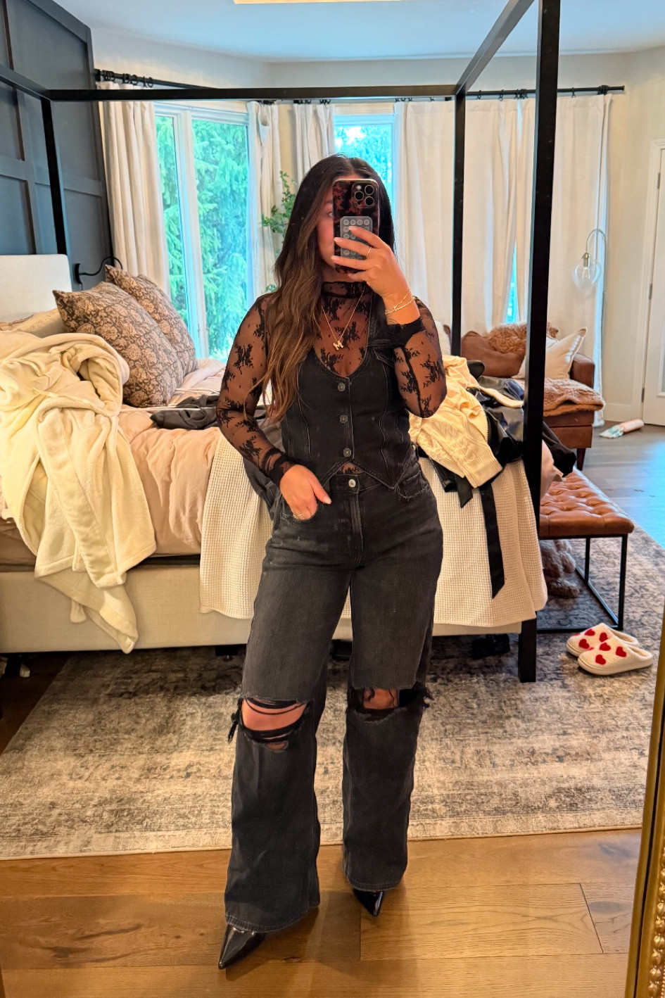 An all black & denim outfit! 

Black jeans 
Denim vest 
American eagle 
Black denim 
Lace top 
Date night outfit 

#LTKSeasonal #LTKStyleTip #LTKFindsUnder100