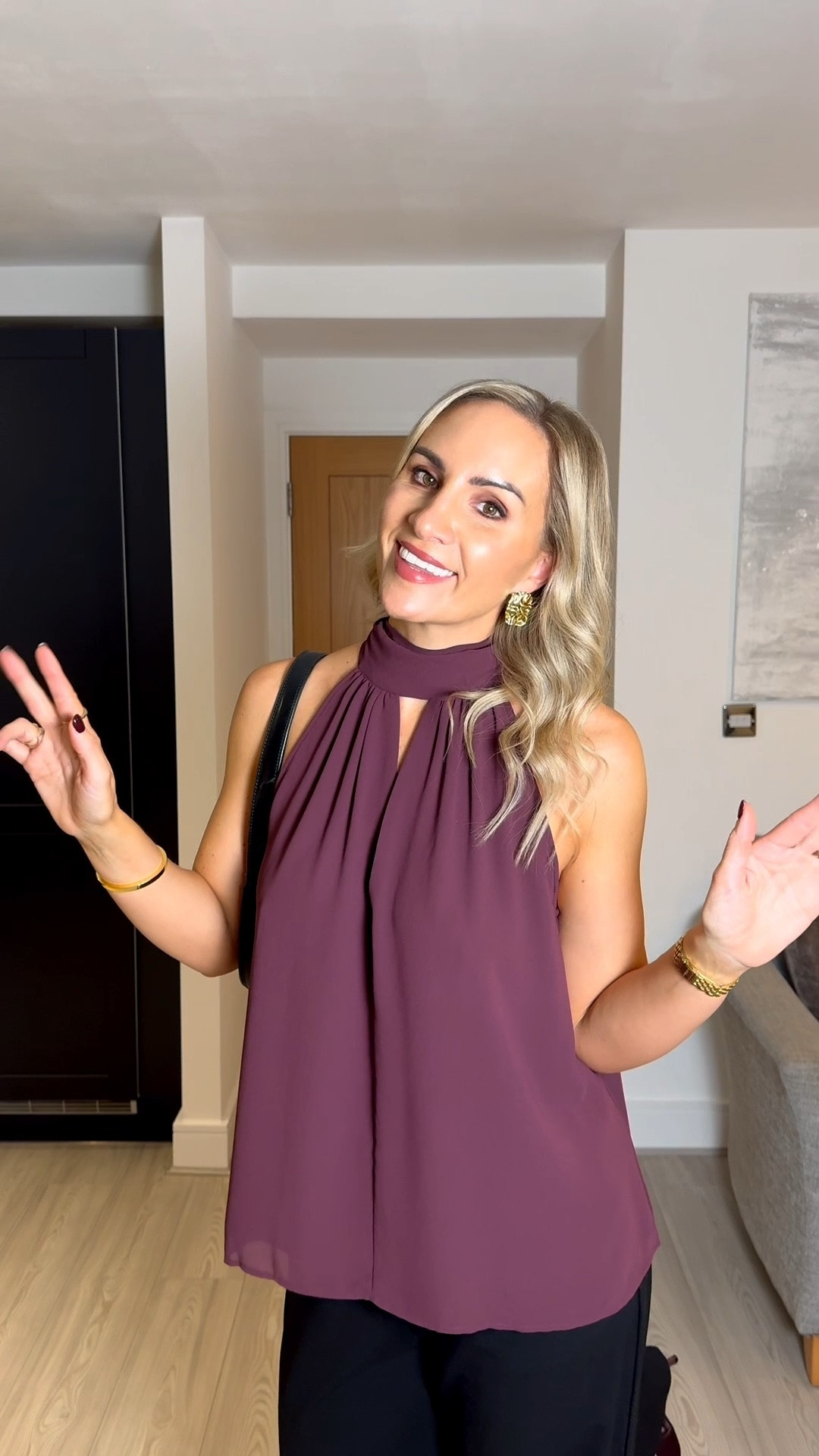 Date night outfit inspiration 🫶🏼

Floaty burgundy halter top paired with black tailored trousers, kitten heels and a shoulder bag. Gold statement earrings. I’m wearing a size S in the top. 

#LTKdatenight #LTKstyletip #LTKautumn