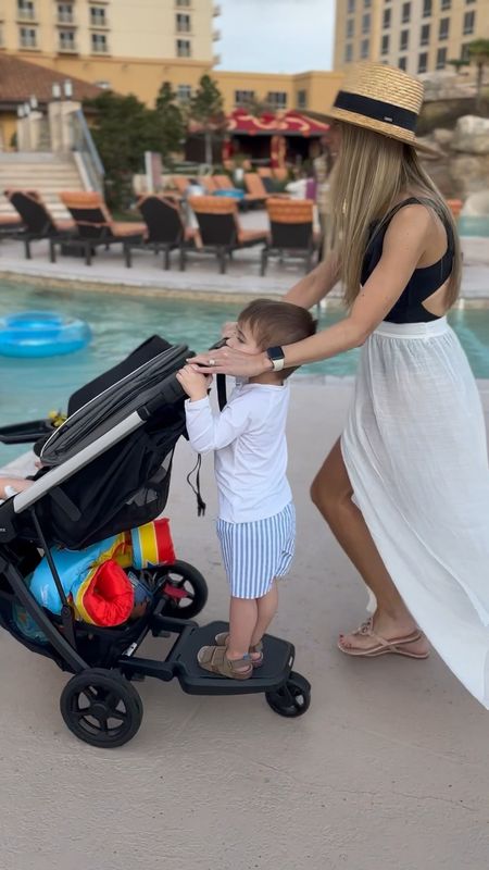 We are obsessed with this stroller and the rider board attachment! This black swimsuit from Target fits perfect and is tts, I’m wearing size small. Dawson’s shorts run big, size down. Stroller, rider board stroller, double stroller, target swim sale, kids swim trunks, baby swim, summer vacation, resort wear, beach vacation, classic swim, preppy swim. Callie Glass @glass_alwaysfull 

#LTKswim #LTKtravel #LTKSeasonal