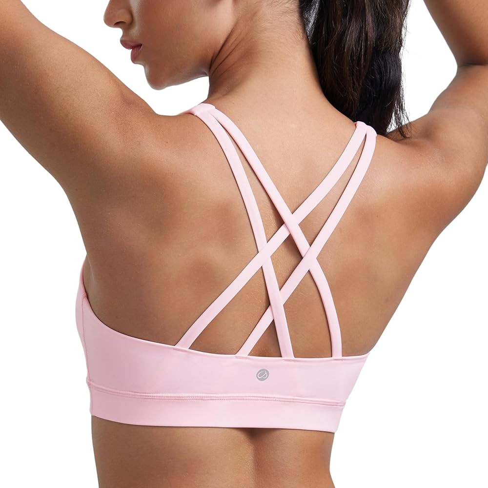 CRZ YOGA Women's Strappy Sports Bras Fitness Workout Padded Yoga Top Criss Cross Back Cami | Amazon (US)