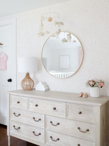 The sweetest girl’s nursery that they can grow into for years to come and mama can enjoy just as much. 💕 The blush wallpaper and whitewashed wood dresser are timeless elements that can be used forever. It’s the unicorn mobile for me, though. 

Shop the look and follow @pennyandpearldesign for more interior design and home style 

Design by @pennyandpearldesign
Photo by @marinaporl

#LTKbaby #LTKstyletip #LTKhome