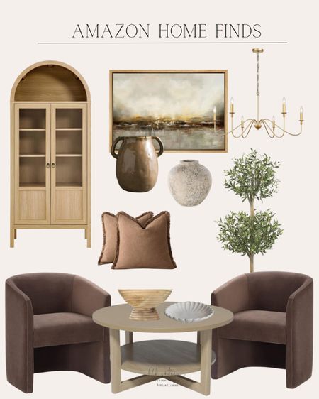 Amazon Home Finds 
Ceramic handmade antique vase / gold chandelier / oak wood display cabinet / olive double topiary silk tree / modern accent chair / decorative linen fringe throw pillow / round coffee table / brown ceramic vase / wood scalloped white dish / dramatic golden landscape 

#LTKHome