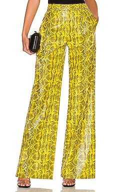 Alice + Olivia Vegan Leather Snake Pant in Sunflower & Black from Revolve.com | Revolve Clothing (Global)