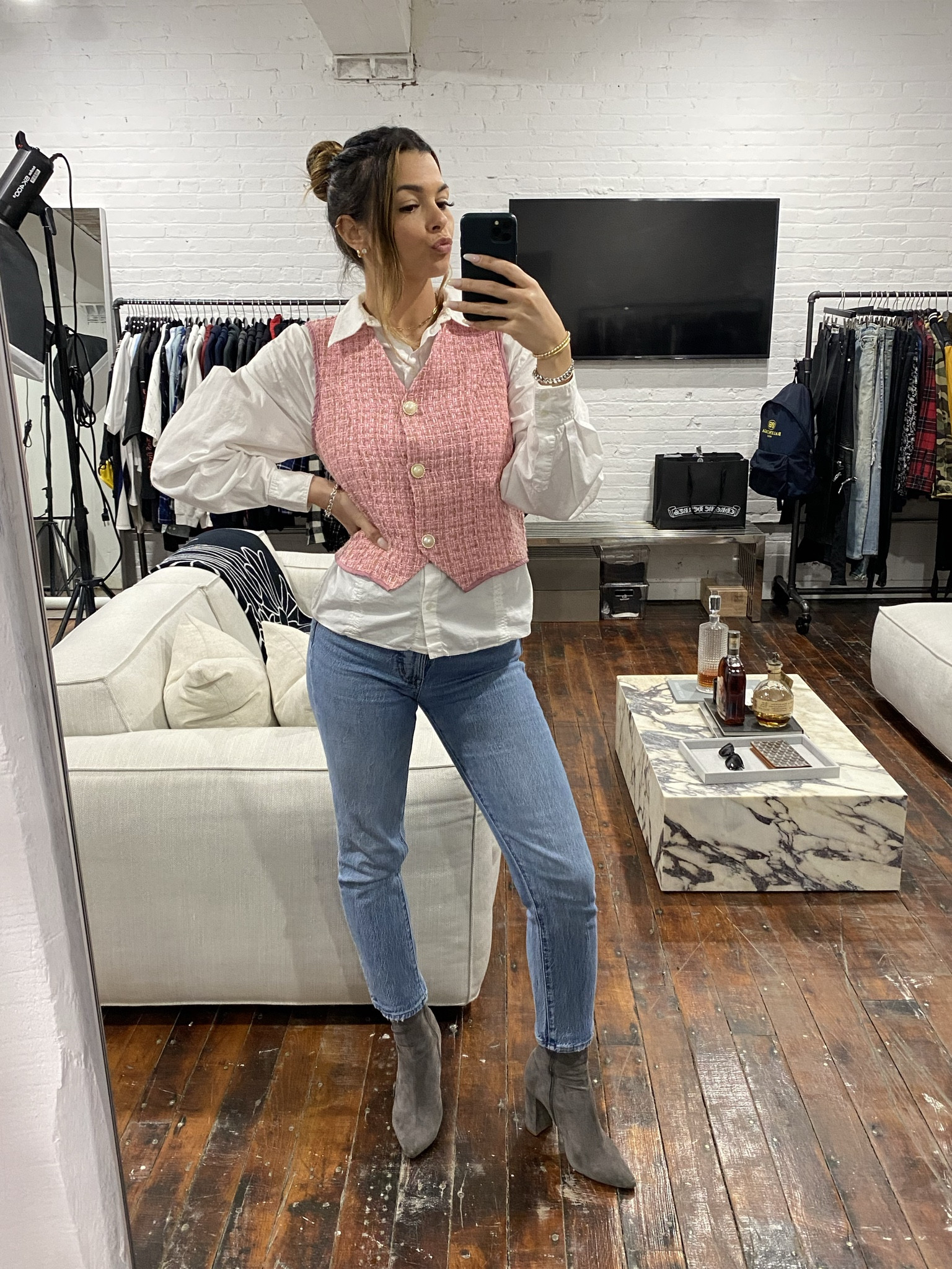 Spring outfit , spring workwear , vest , work outfit , spring , pink vest , booties , marble table , coffee table , button down shirt 

#LTKworkwear #LTKSeasonal #LTKhome