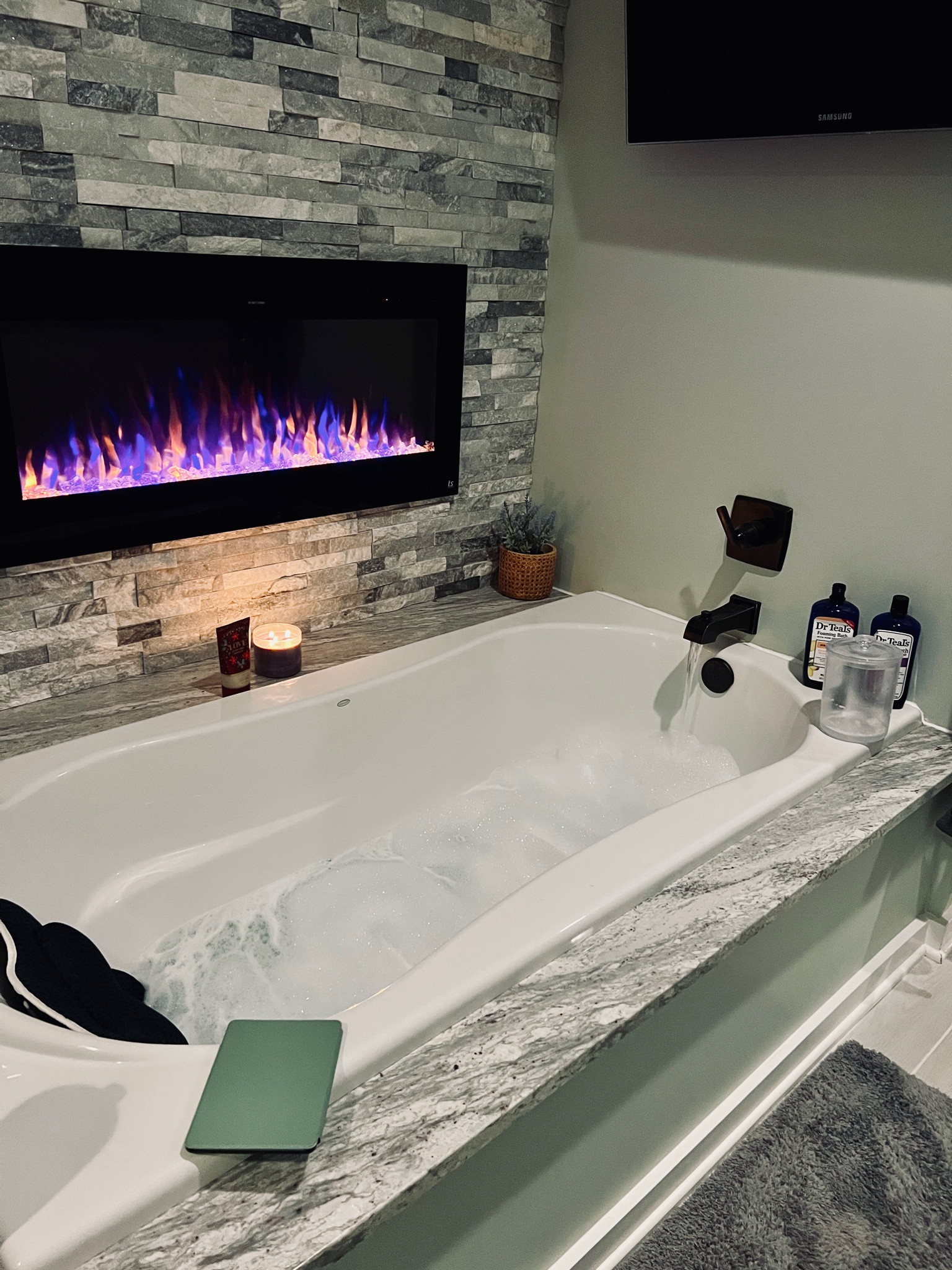 My favorite spot to relax and unwind. Everyone needs an extra large soaking tub and fireplace! 

#LTKHome