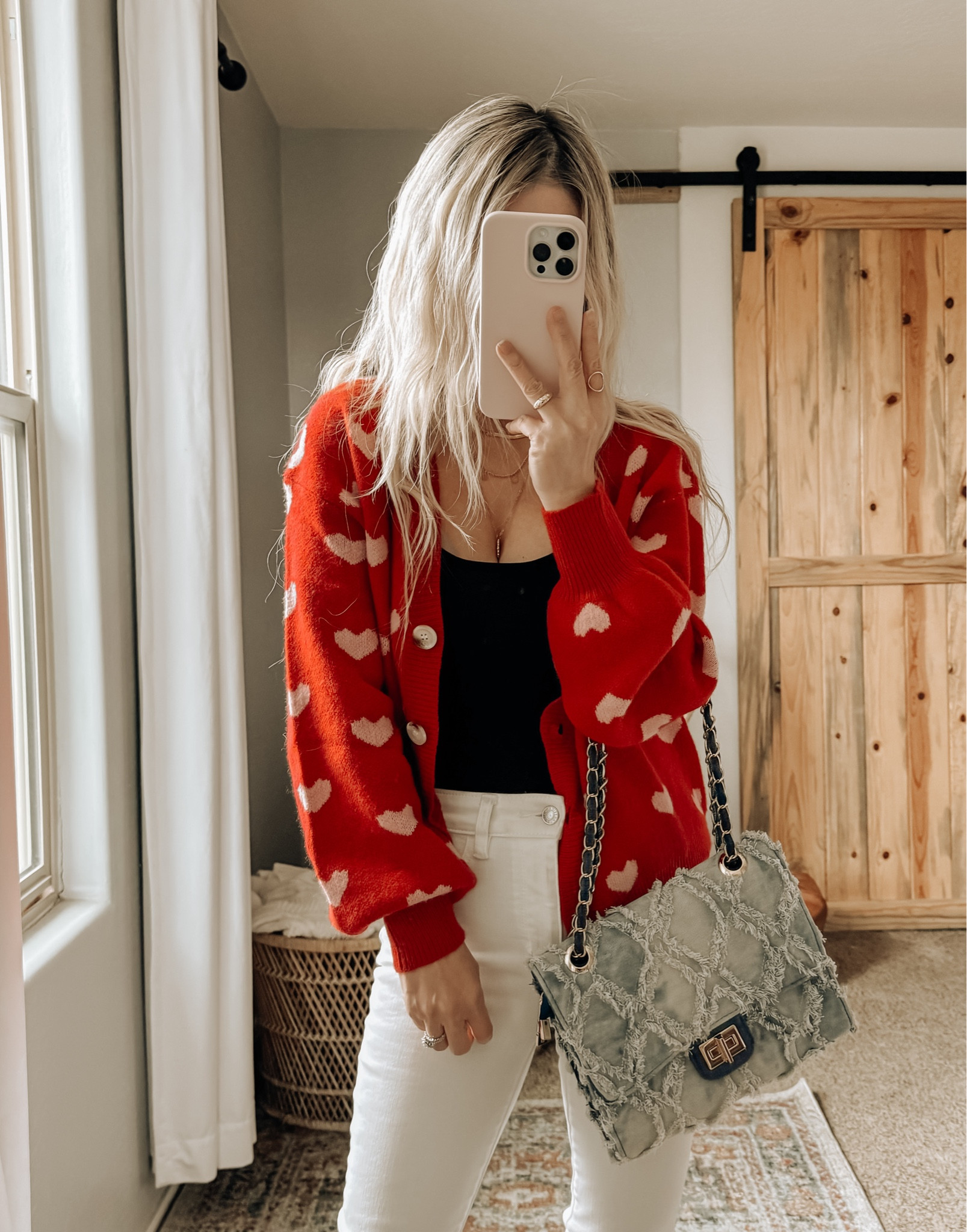 Valentine’s Day heart cardigan that looks cute open or buttoned up. 

#LTKstyletip #LTKSeasonal #LTKfindsunder50