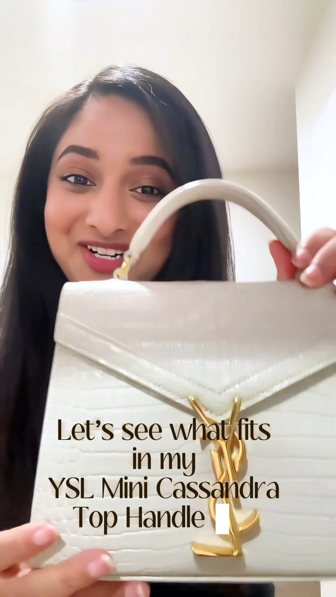 What fits in YSL Mini Cassandra Top Handle Bag! 

#LTKItBag