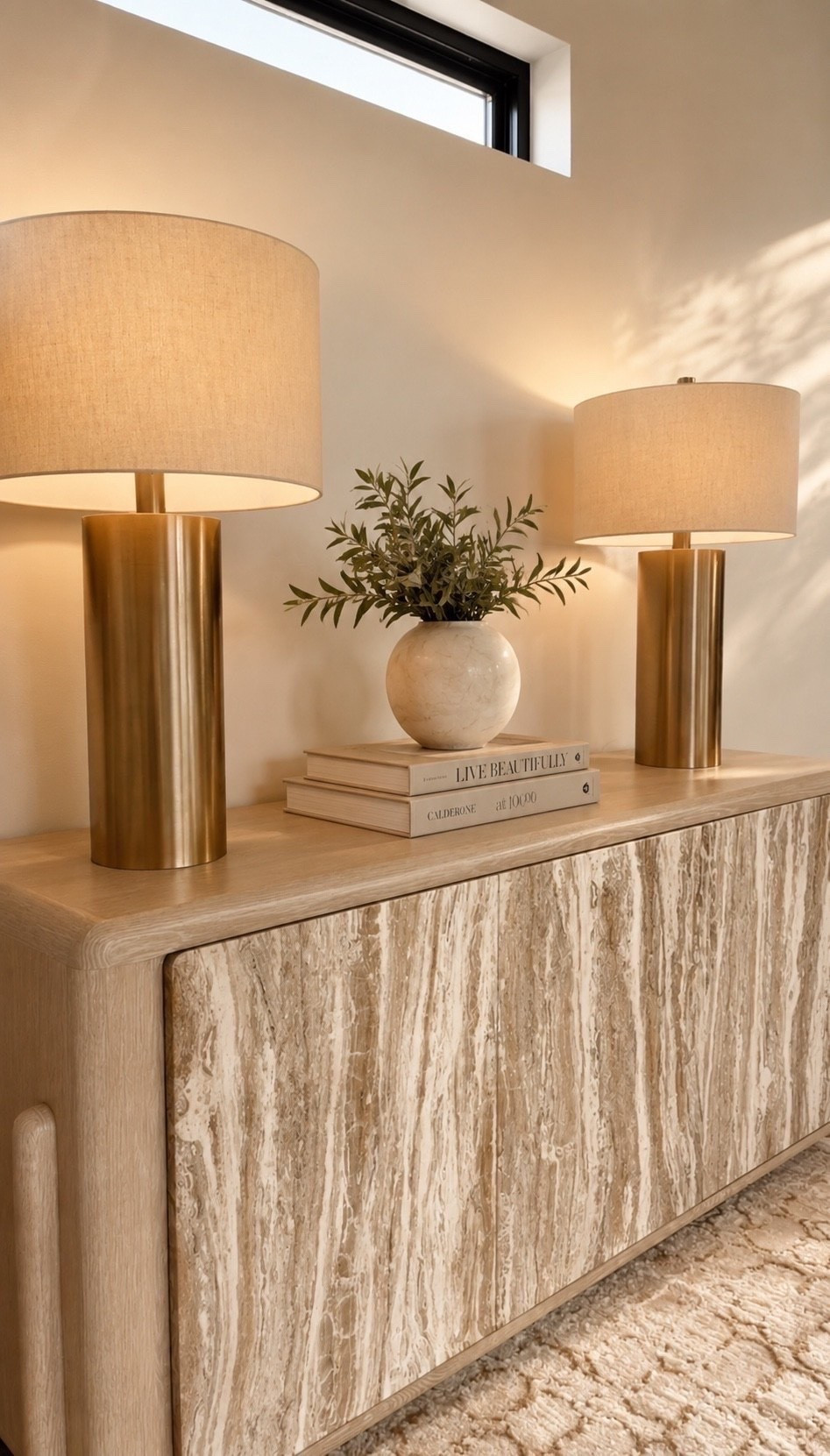 This lamp and dresser combo is truly stunning. The soft neutrals and subtle gold accents pair so beautifully. Add a few of your favorite decorative pieces and you’ve instantly created a polished, elevated moment. Such an easy way to style an empty space and make it feel intentional. 

Summerthompsonstyles

---

lamp styling dresser decor neutral home gold accents home styling modern decor interior inspiration elevated design

#LTKHome #LTKU #LTKdayinmylife